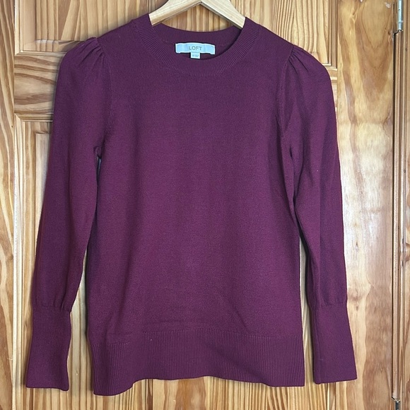 Loft sweater. Women’s size extra small. Maroon in color with a ruffled sleeve. - Picture 1 of 6
